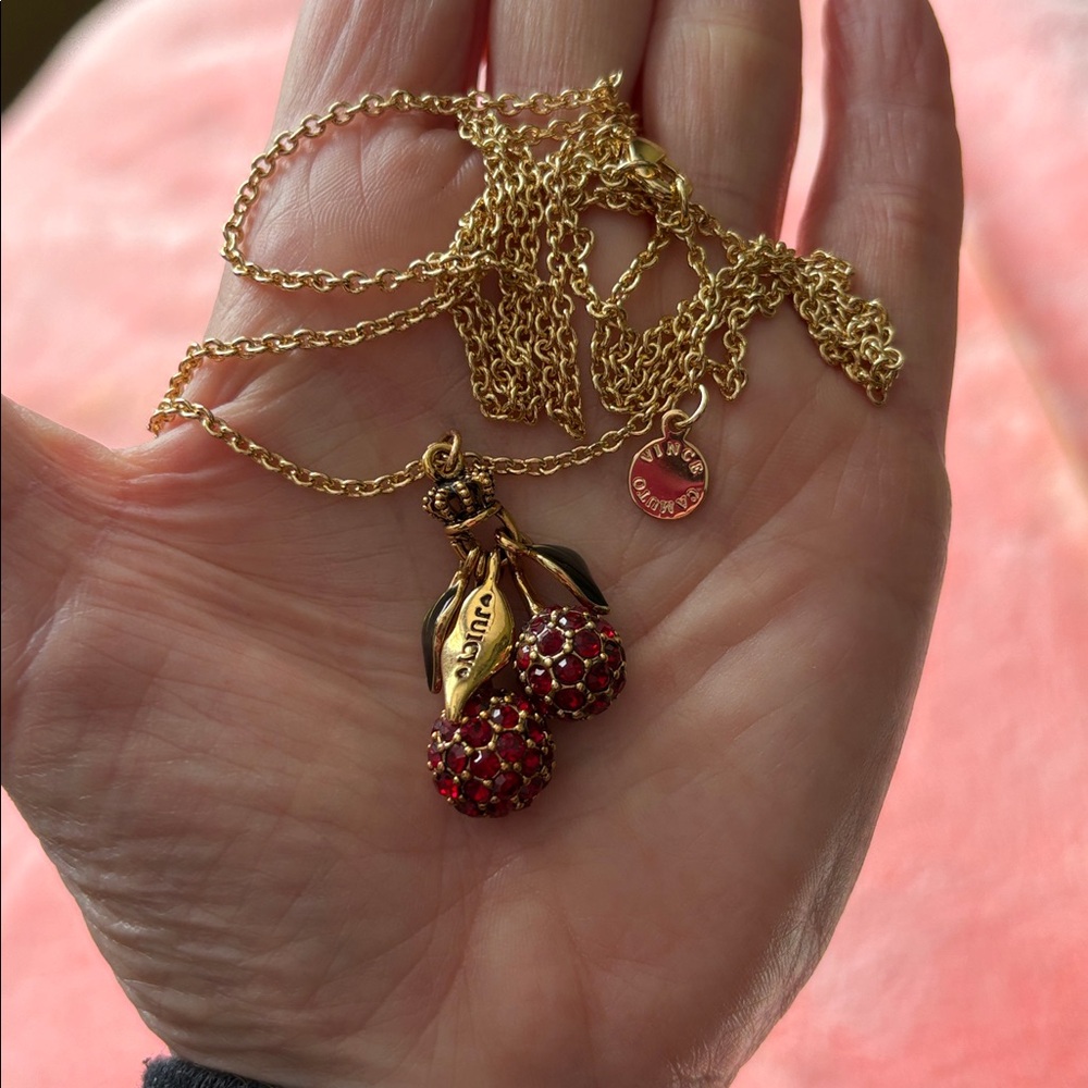 Cherry “Juicy” Couture. 
Red Crystal Cherries with Green enamel leaves Necklace.